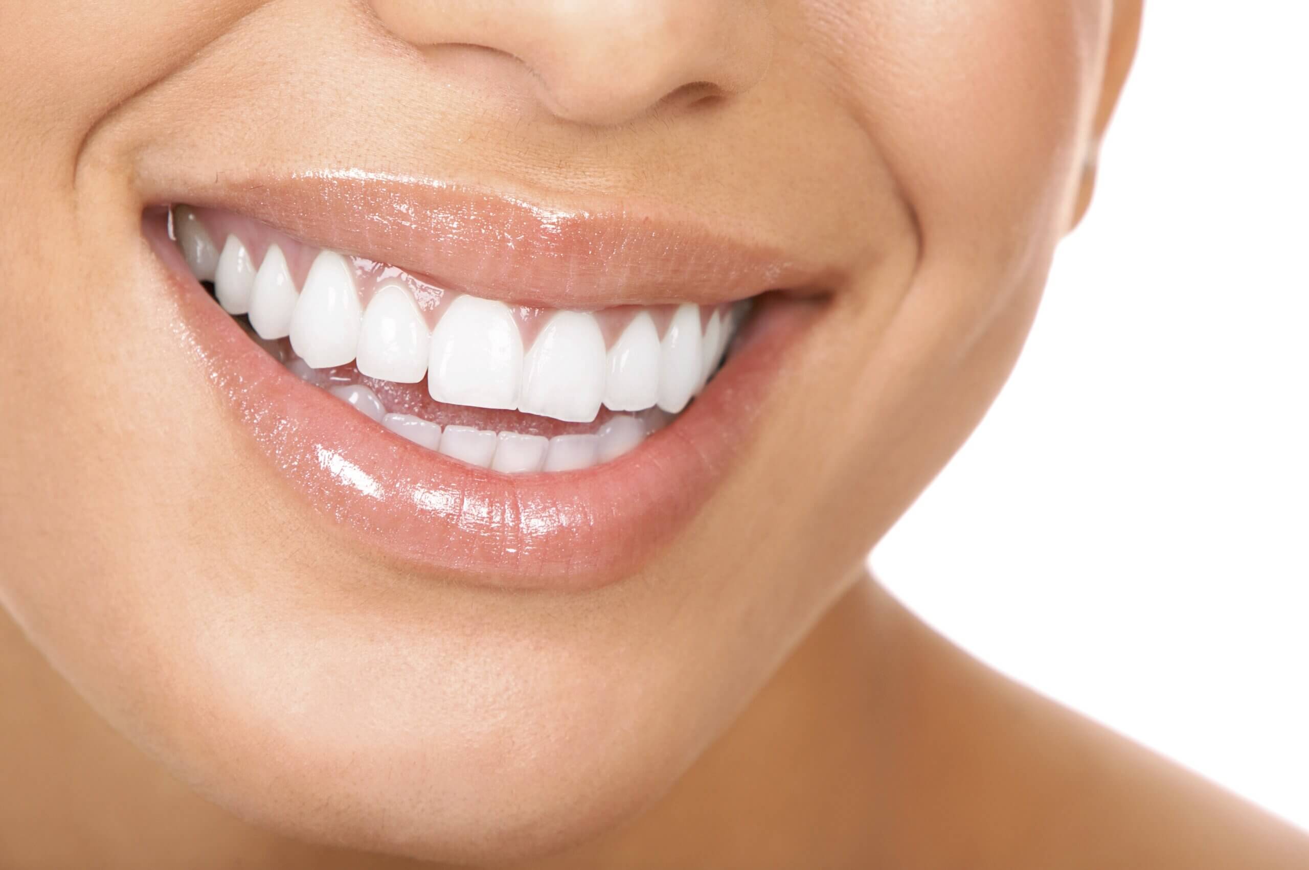 Close Up of Woman's Full Set of White Teeth