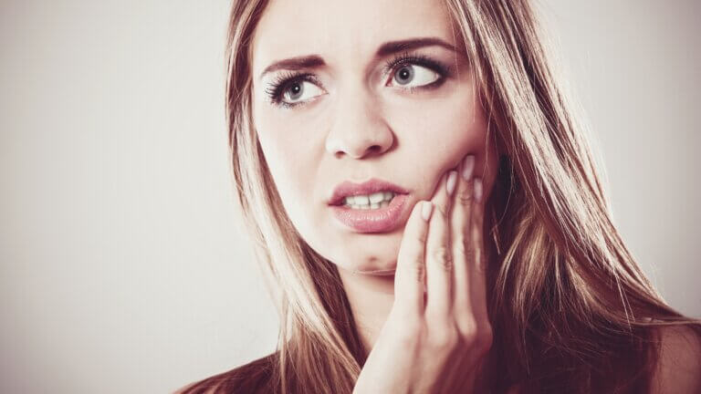 Woman Suffering from Tooth Pain